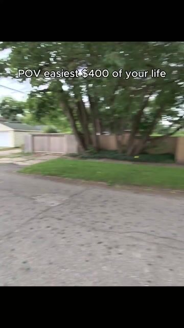 An overgrown Detroit alley, cleared in a day. $400 to the local who did it.